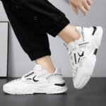 Black chunky sneakers for men with thick sole and modern design