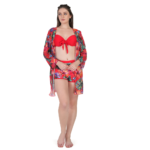 Woman wearing red tropical print bikini set with matching sheer cover-up and shorts, stylish 3 piece beachwear outfit for women