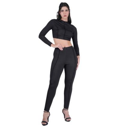 woman wearing black sportswear gym set crop top and leggings quick dry activewear front view