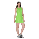 Woman wearing green tennis dress athletic sportswear for workout golf and outdoor activities