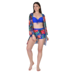 Woman wearing blue tropical print bikini set with matching sheer cover-up and shorts, stylish 3 piece beachwear outfit for women