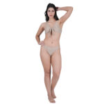 woman posing with hand up wearing beige halter knotted bikini set beachwear