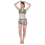 Front view of women’s dark green halter bikini set with floral high-waist shorts, stylish summer beachwear