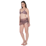 Side view of woman wearing a 3 piece bikini set with sheer wrap skirt, low waist beachwear for summer