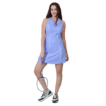 Woman wearing blue tennis dress holding racket athletic sportswear for tennis and outdoor sports