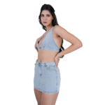 side view of women wearing light blue denim co ord set crop top and mini skirt trendy two piece outfit