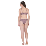 Back view of woman wearing a 3 piece bikini set, low waist swimwear for beach and summer fashion