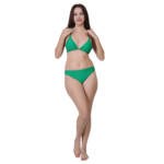 Woman posing in green bikini set stylish swimwear for beach vacation and poolside