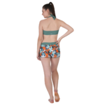 Back view of women’s dark green halter bikini set with floral printed high-waist shorts, stylish summer beachwear