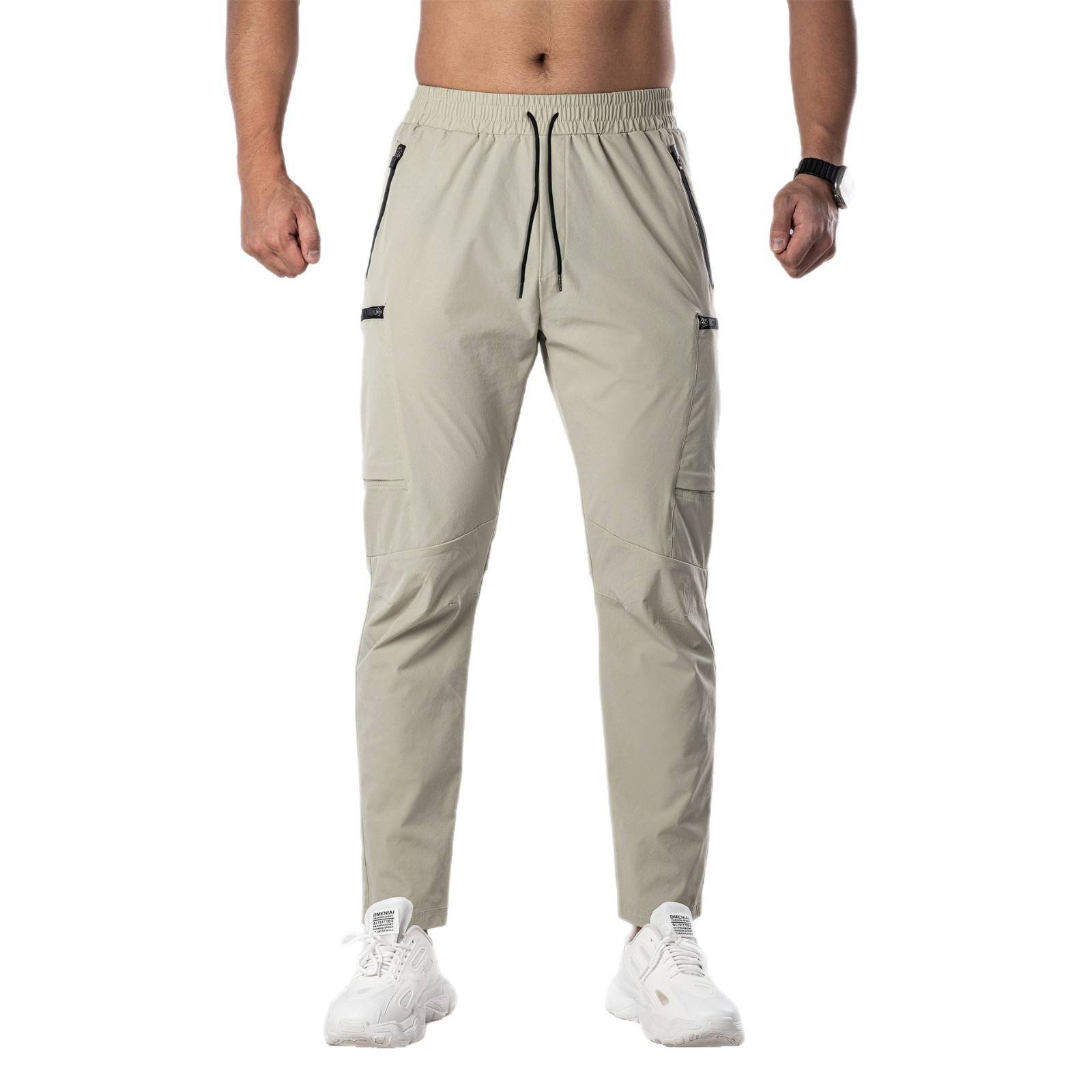 H15ad37d9de7e42dd8e36f7d92ef1e8155 Men’s Stretchable Sports Cargo Pants - Image 1